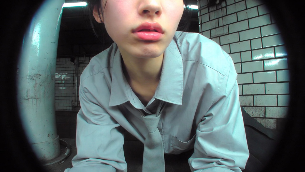 A stunning mid-20s Japanese or Korean woman wearing a light grey collar… 1