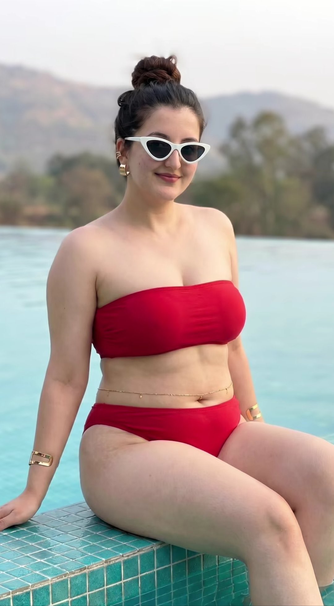 A stunning photorealistic portrait of a confident curvy Indian woman st… 1