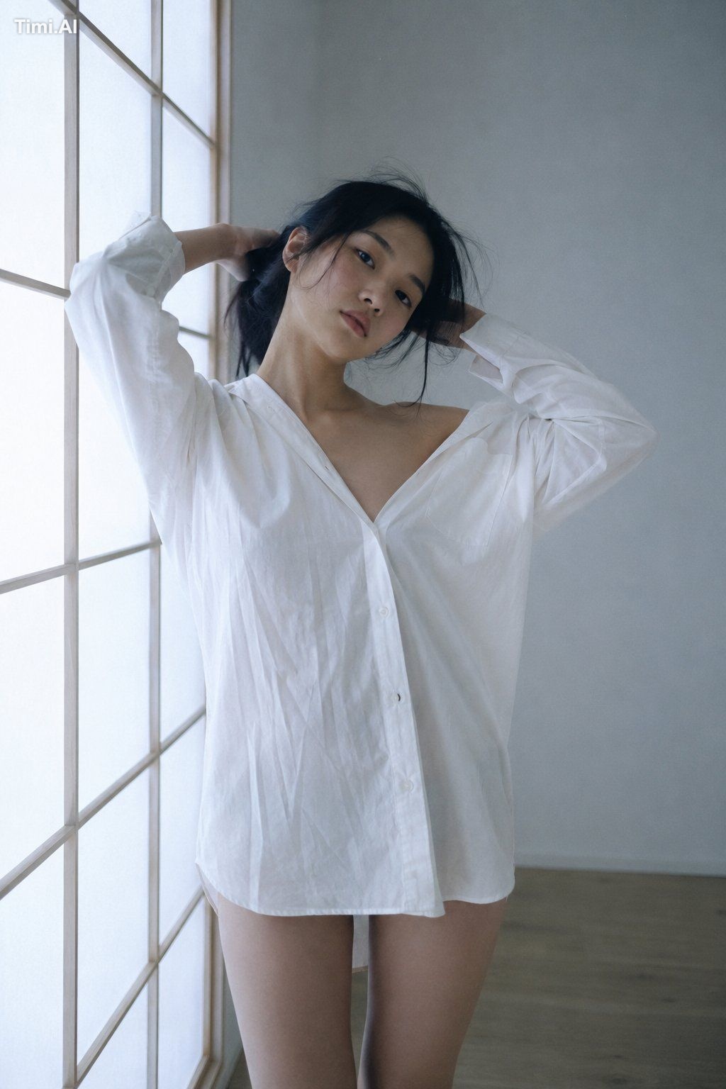 A medium portrait captured with a 50mm lens at f/2.0. The subject is a …
