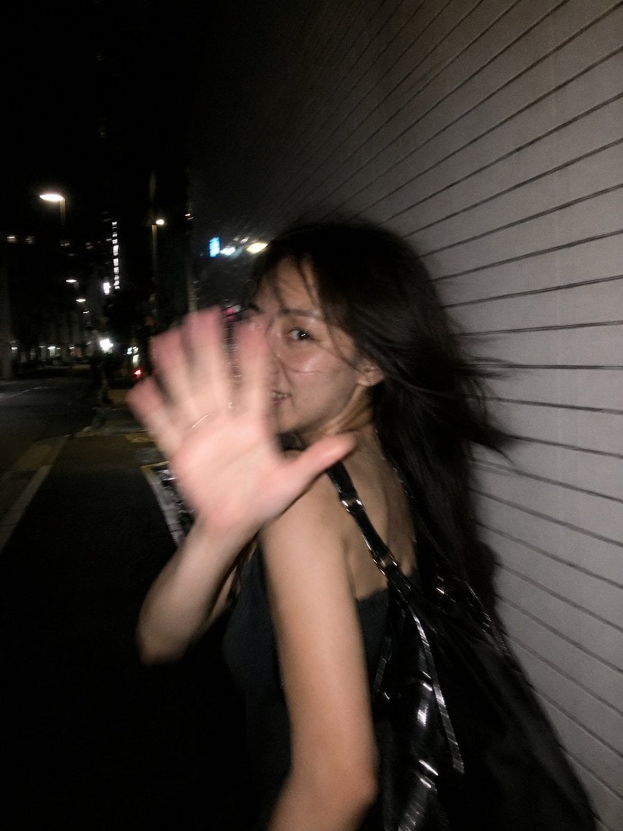 Ultra-realistic candid smartphone flash photograph, portrait orientatio…