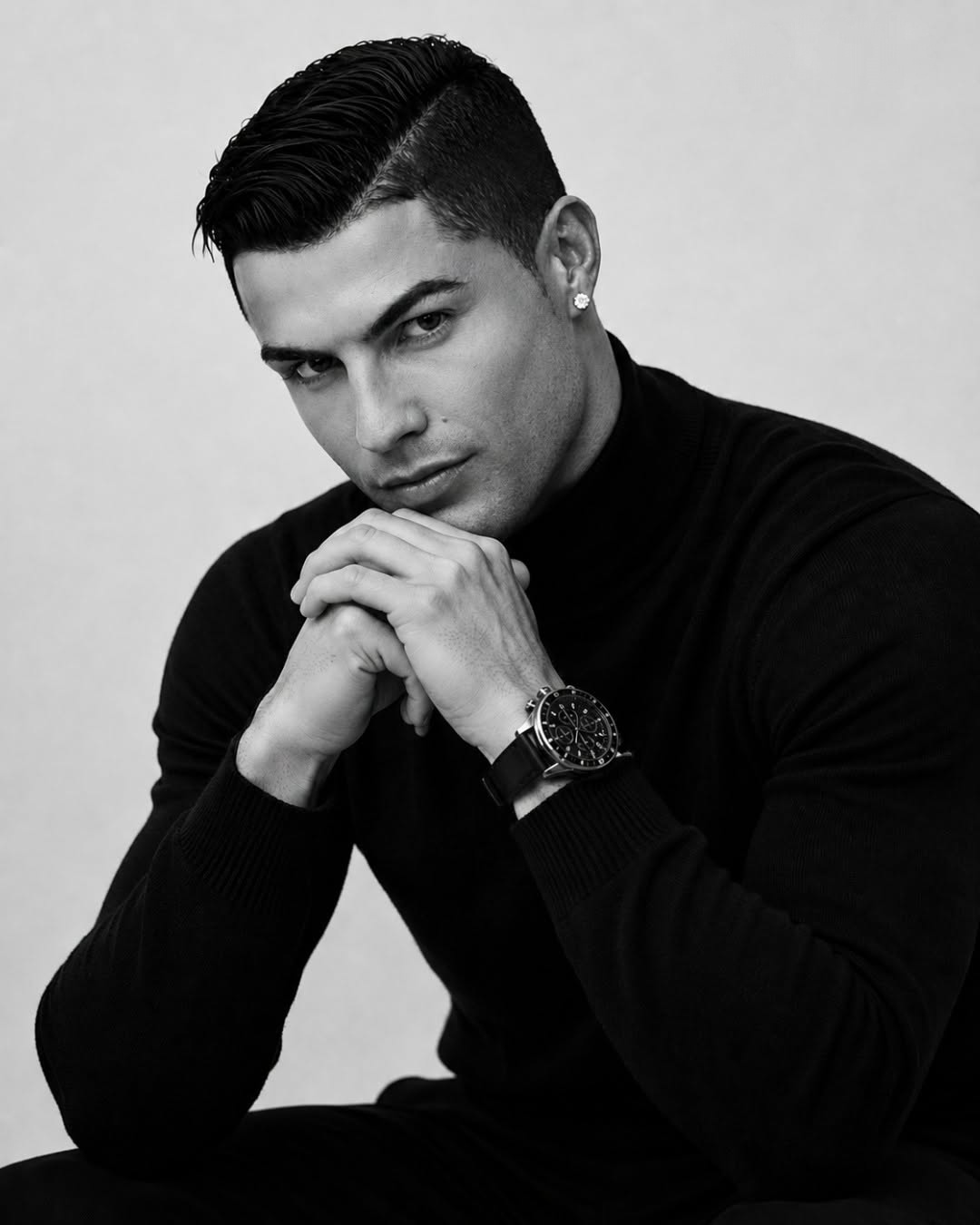 Ultra-realistic monochrome fashion portrait of a confident athletic man…