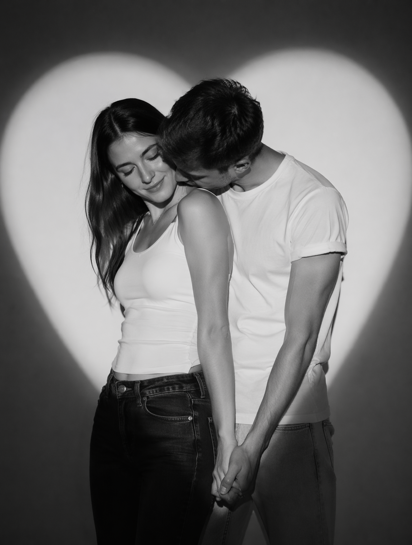 Create a romantic black-and-white studio portrait of a real skinny, not…