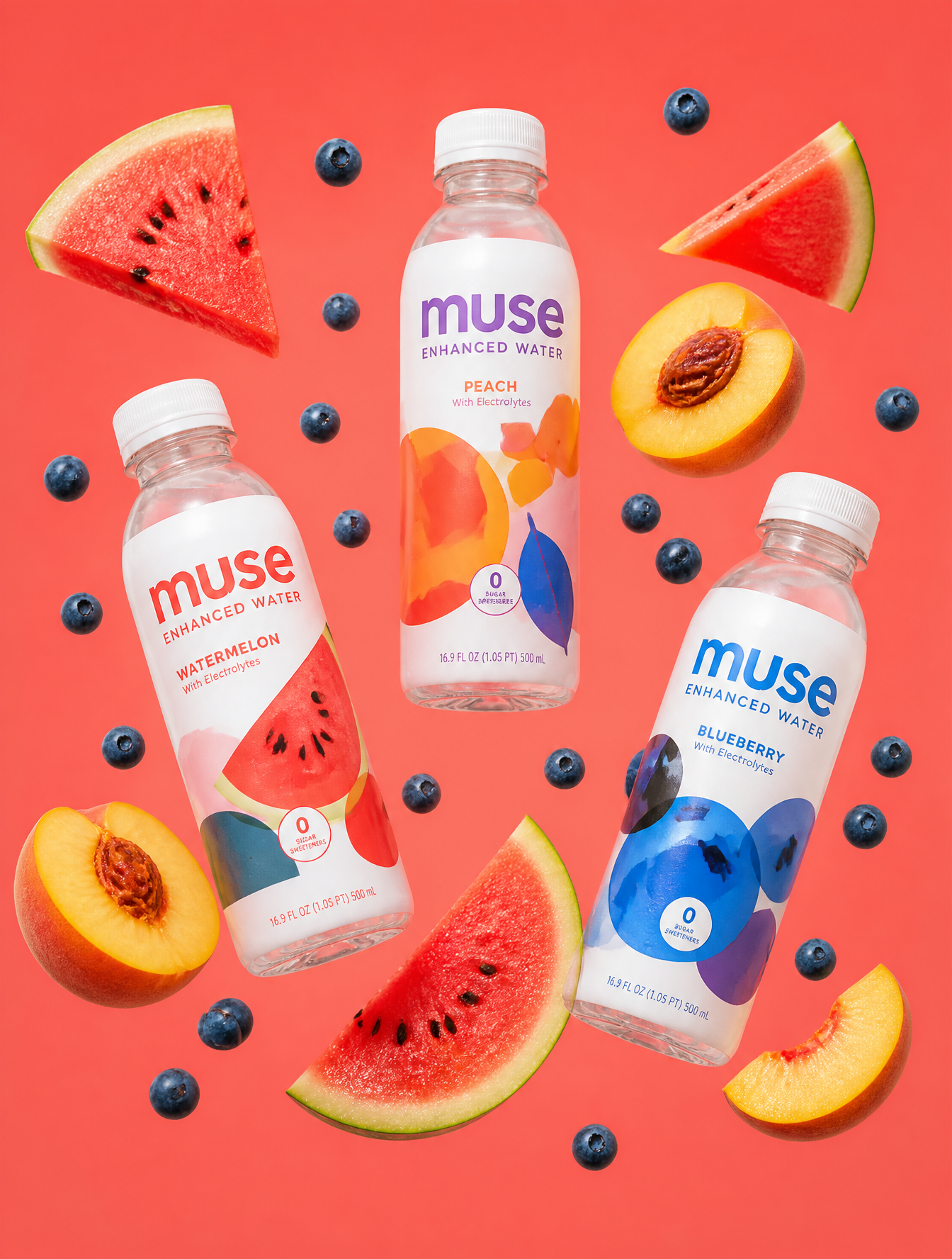 Three branded plastic bottles of Muse enhanced water are suspended in a…