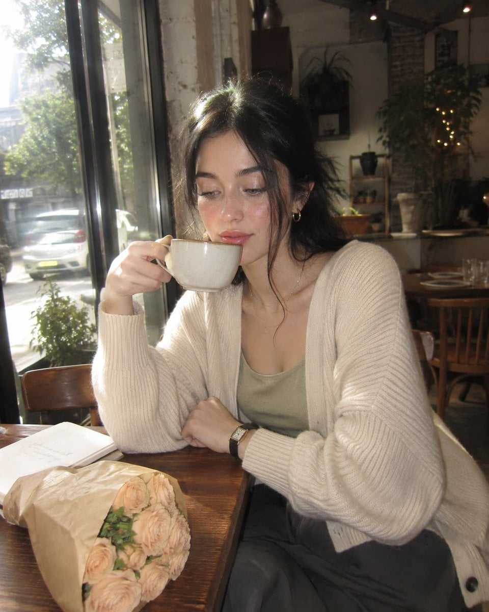 Create an ultra-realistic nostalgic café portrait captured on a premium…