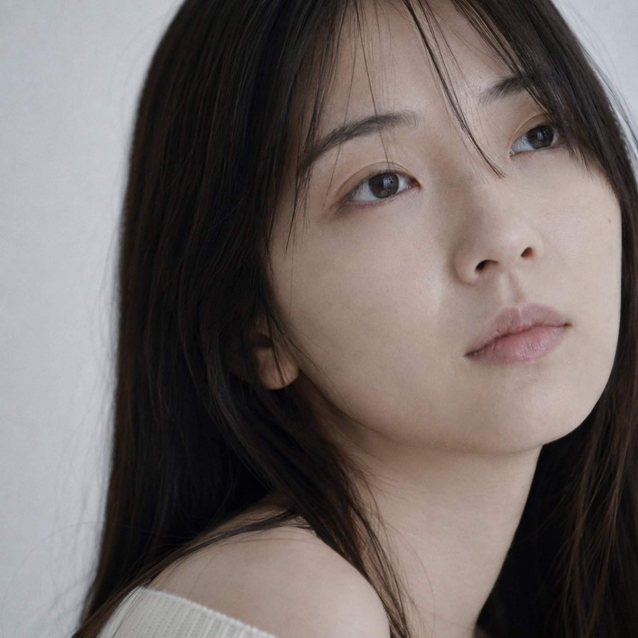 Portrait shot on 85mm f/1.8, tight close-up face portrait of a Japanese… 2