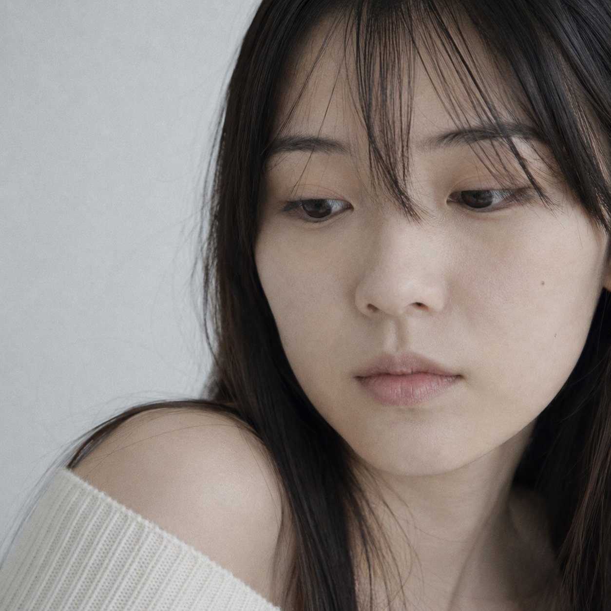 Portrait shot on 85mm f/1.8, tight close-up face portrait of a Japanese… 3