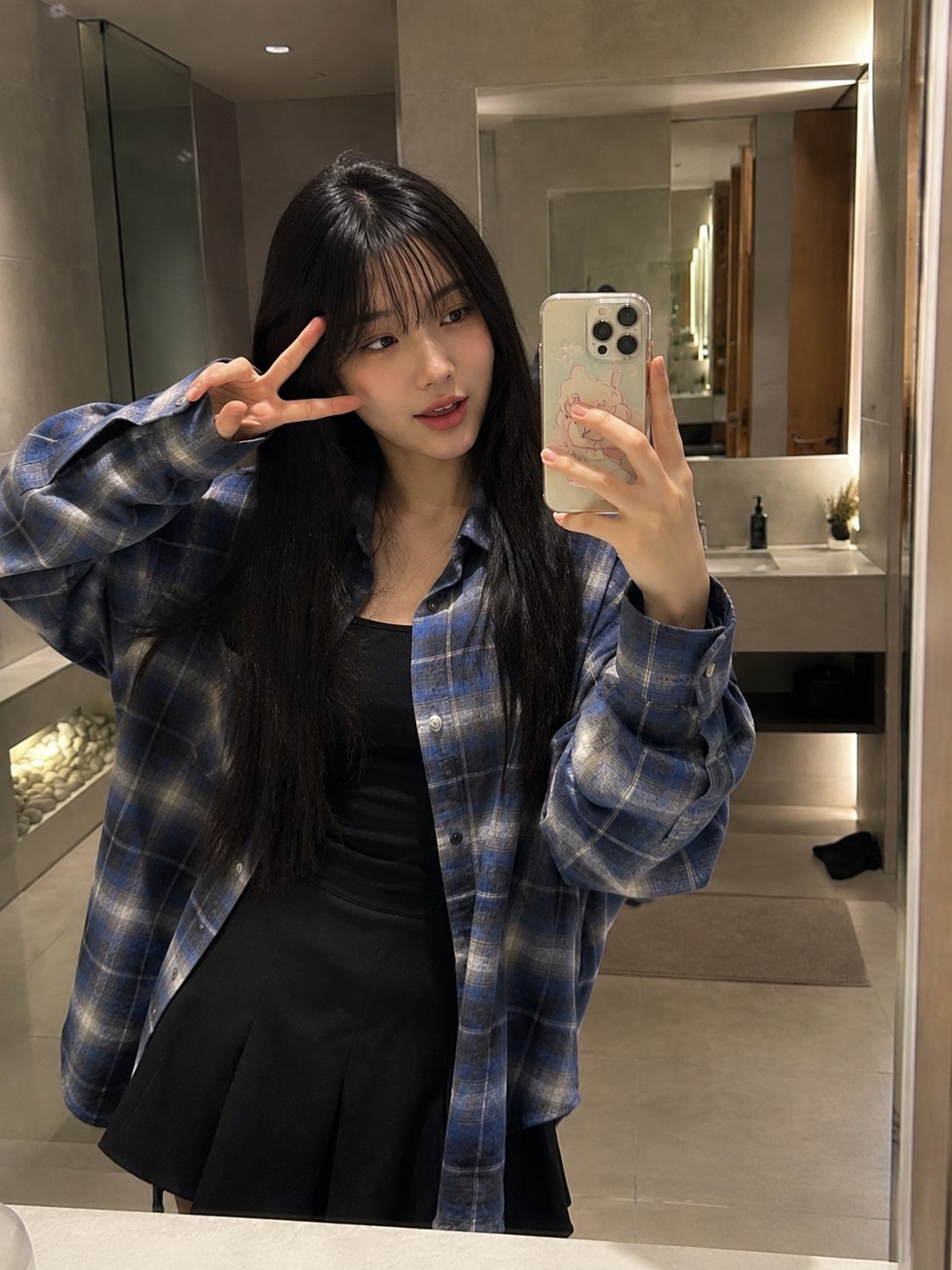 Beautiful young Japanese woman with long straight black hair and soft w…