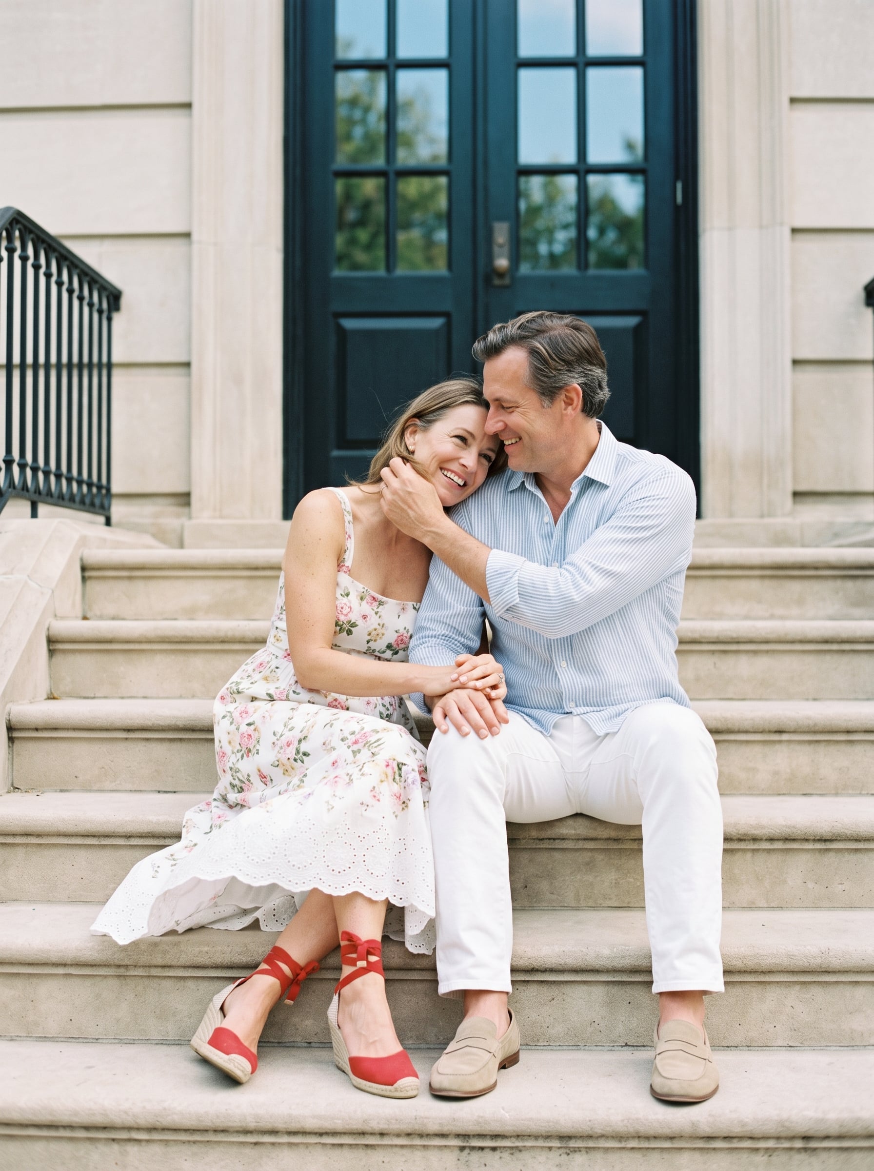 On a quiet afternoon, a relaxed, romantic moment unfolds on the steps o…